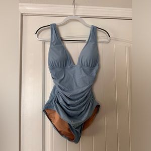 Jcrew one piece swimsuit. Light blue plunge neck size 6. Never worn, no tag.